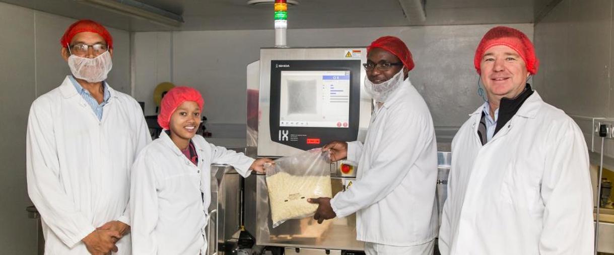 A 7760 Henk Geustyn (Senior Cheesemaker), Bronwyn Cook (Machine Assistant), Elastos Mudzamatira (Machine Operator), With Ishida's Flip Van Biljon (LR)